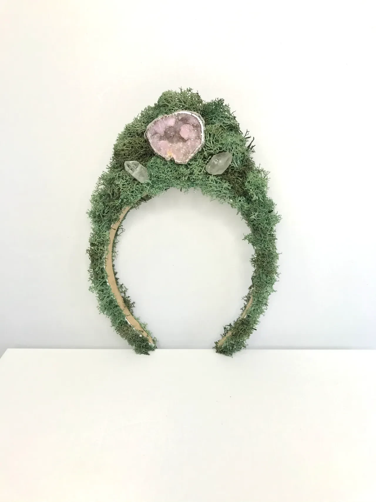 Moss covered figure with seashells botanical art